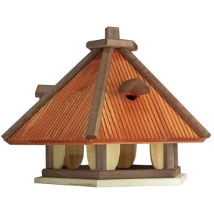 Drewniany karmnik dla ptaków ze spiczastym dachem i otworami do karmienia. Kategoria: Karmniki dla ptaków.