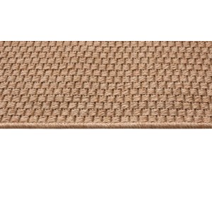 Zbliżenie beżowego dywanu z krótkim włosiem o tkanej strukturze.