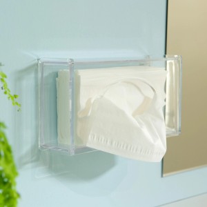 Uchwyt ścienny na chusteczki kosmetyczne z przezroczystego tworzywa sztucznego.