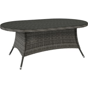 Szary, owalny stół ogrodowy t.b.t. z rattanu i szklanym blatem.