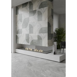 Nowoczesne szare płytki podłogowe z geometrycznym wzorem na ścianie i podłodze.