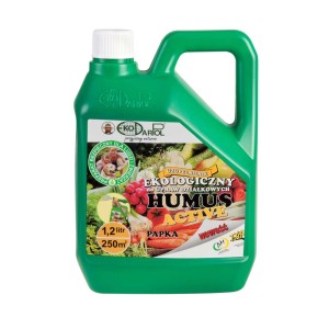 Zielona butelka t.b.t. uniwersalnego nawozu płynnego do ogrodu i roślin.