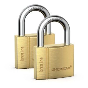 Dwa złote kłódki mosiężne Gerda z hartowanym stalowym pałąkiem.