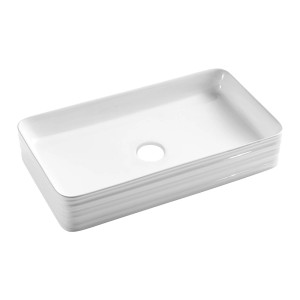 Prostokątna, biała umywalka nablatowa t.b.t. z ceramiki.