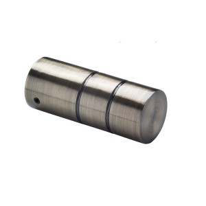 Końcówka karnisza w metalowym wyglądzie, cylindryczny kształt.