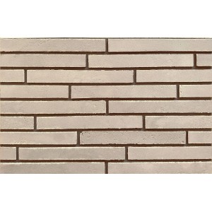 Jasne, podłużne płytki klinkierowe t.b.t. jako dekoracyjna okładzina ścienna.