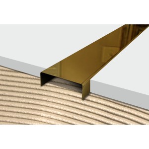 Złota listwa dekoracyjna/wykończeniowa do ścian i podłóg.