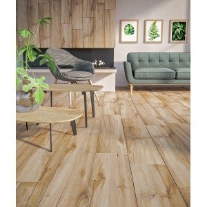 Ułożone płytki podłogowe t.b.t. imitujące drewno w salonie.