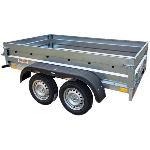 Przyczepa t.b.t., srebrna, z dwoma kołami i czarnymi błotnikami.