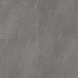 Ułożone szare panele winylowe t.b.t. o wyglądzie kamienia.