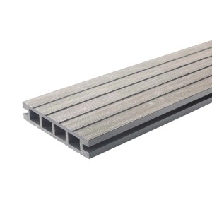 Szara deska tarasowa t.b.t. z rowkowaną powierzchnią i profilem komorowym.