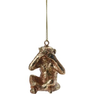 Złota figurka małpy "Nic nie widzę" jako dekoracja ogrodowa.