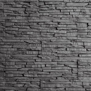 Szara ściana z cegły t.b.t. do użytku wewnętrznego i zewnętrznego jako dekoracyjna okładzina kamienna.