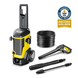 Żółto-czarna myjka ciśnieniowa z akcesoriami, takimi jak wąż i dysze.