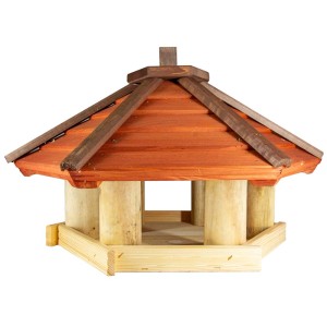 Drewniany karmnik dla ptaków z czerwonym dachem do ogrodu.