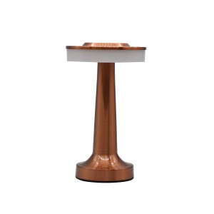 Lampa stołowa t.b.t. w miedzianym kolorze do nastrojowego oświetlenia.