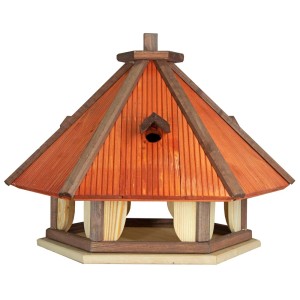 Drewniany karmnik dla ptaków z czerwonym dachem do ogrodu.