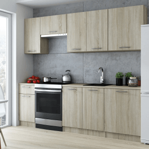 Jasny zestaw mebli kuchennych t.b.t. z szafkami górnymi i dolnymi, zlewem i kuchenką.