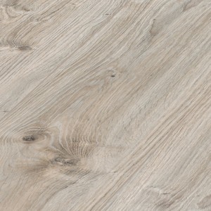 Zbliżenie jasnych paneli podłogowych t.b.t. z teksturą drewna.