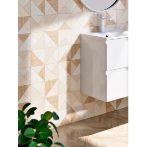 Nowoczesny zestaw łazienkowy z białą szafką umywalkową i geometrycznym wzorem płytek.