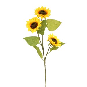 Żółty sztuczny słonecznik z zielonymi liśćmi, idealny jako dekoracja.