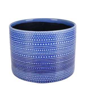 Niebieska doniczka t.b.t. w białe kropki do wnętrz i ogrodu.