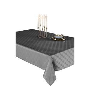 Szary obrus ze wzorem geometrycznym, element dekoracji stołu.