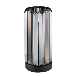Nowoczesna lampa stołowa t.b.t. z pryzmatycznymi elementami szklanymi i czarną podstawą.