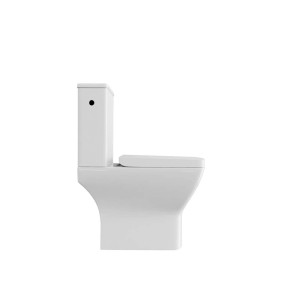 Białe, kompaktowe WC t.b.t., widok z boku.