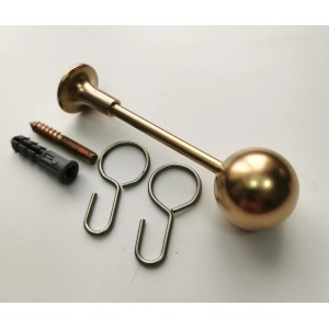 Złoty uchwyt karnisza t.b.t. z akcesoriami montażowymi.