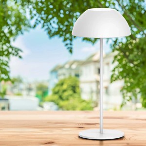 Biała lampa stołowa t.b.t. do dekoracyjnego oświetlenia wnętrz.