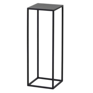 Minimalistyczny, czarny metalowy stojak na kwiaty.