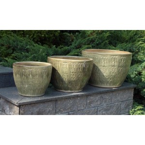 Zestaw trzech zielonych doniczek t.b.t. z wzorem plastra miodu do ogrodu.