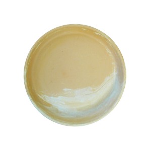 Beżowa miska z białym akcentem kolorystycznym, zbliżenie.