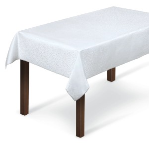 Biały obrus we wzory na drewnianym stole. Kategoria: Obrusy.