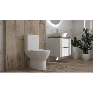 Białe, kompaktowe WC t.b.t. w nowoczesnej łazience.