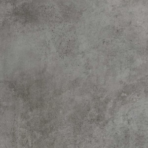 Szara płytka podłogowa o wyglądzie betonu, idealna do nowoczesnych przestrzeni mieszkalnych.