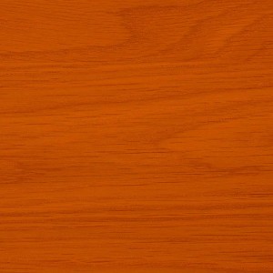 Zbliżenie obrobionego drewna w kolorze pomarańczowym, odpowiednie jako podkład do drewna.