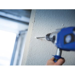 Wiertło do muru LUX Classic (Ø 12 mm) w użyciu na ścianie.