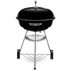 Czarny grill węglowy Weber Compact Kettle Ø 57 cm z kółkami i pojemnikiem na popiół.
