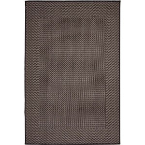 Dywan z krótkim włosiem t.b.t. ze wzorem zygzak w kolorze brązowym i czarnym.