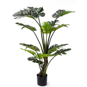 Sztuczna roślina Monstera w doniczce, zielone liście, idealna jako dekoracja.