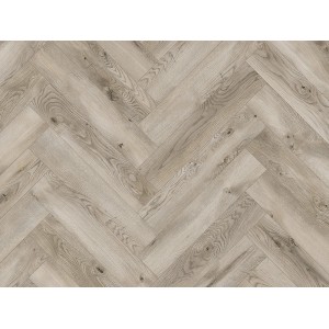 Jasne panele podłogowe t.b.t. ułożone we wzór jodełki.