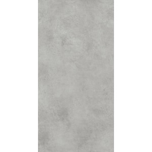 Szara płytka podłogowa o wyglądzie betonu.