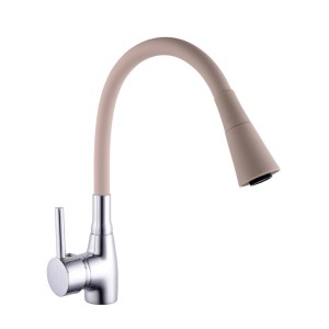 Bateria jednouchwytowa t.b.t. z elastyczną wylewką w kolorze beżowym i chromowanym.