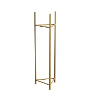 Złoty metalowy stojak na kwiaty t.b.t., minimalistyczny design.