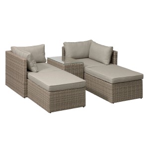 Szary zestaw mebli ogrodowych z fotelami typu lounge i szklanym stolikiem bocznym.