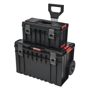 Czarny wózek na narzędzia t.b.t. z dwoma ułożonymi w stos pudełkami.