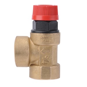 Mosiężny zawór grzewczy z czerwoną nakrętką do instalacji.