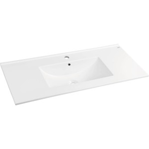 Biały blat umywalkowy t.b.t. ceramiczny do umywalek nablatowych.